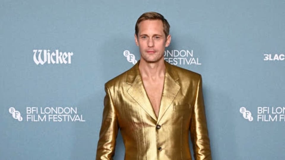 Alexander Skarsgård divides opinion with gold suit and plastic shoes